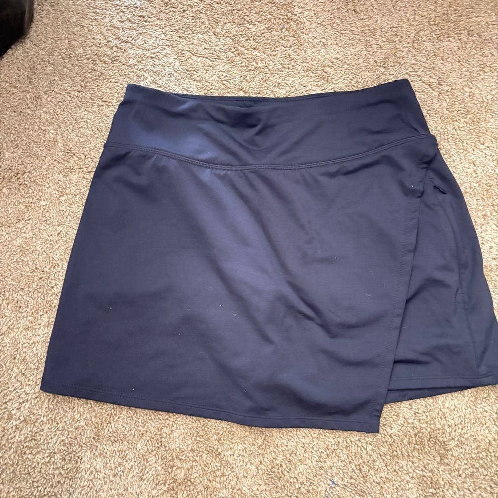 Athleta Navy blue skort asymmetrical hem Size Small
